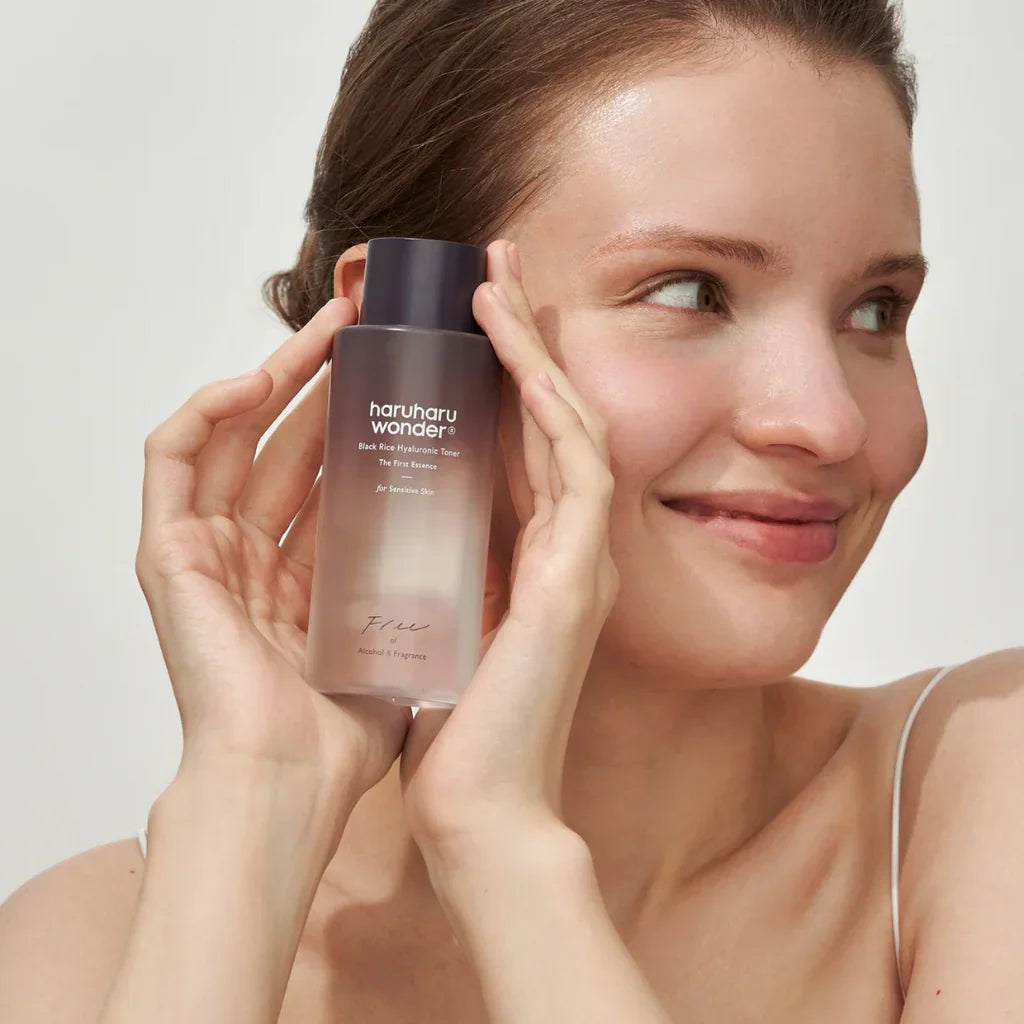 Using Haruharu Wonder Black Rice Hyaluronic Toner on face - hydrating Korean toner suitable for sensitive skin Saudi Arabia