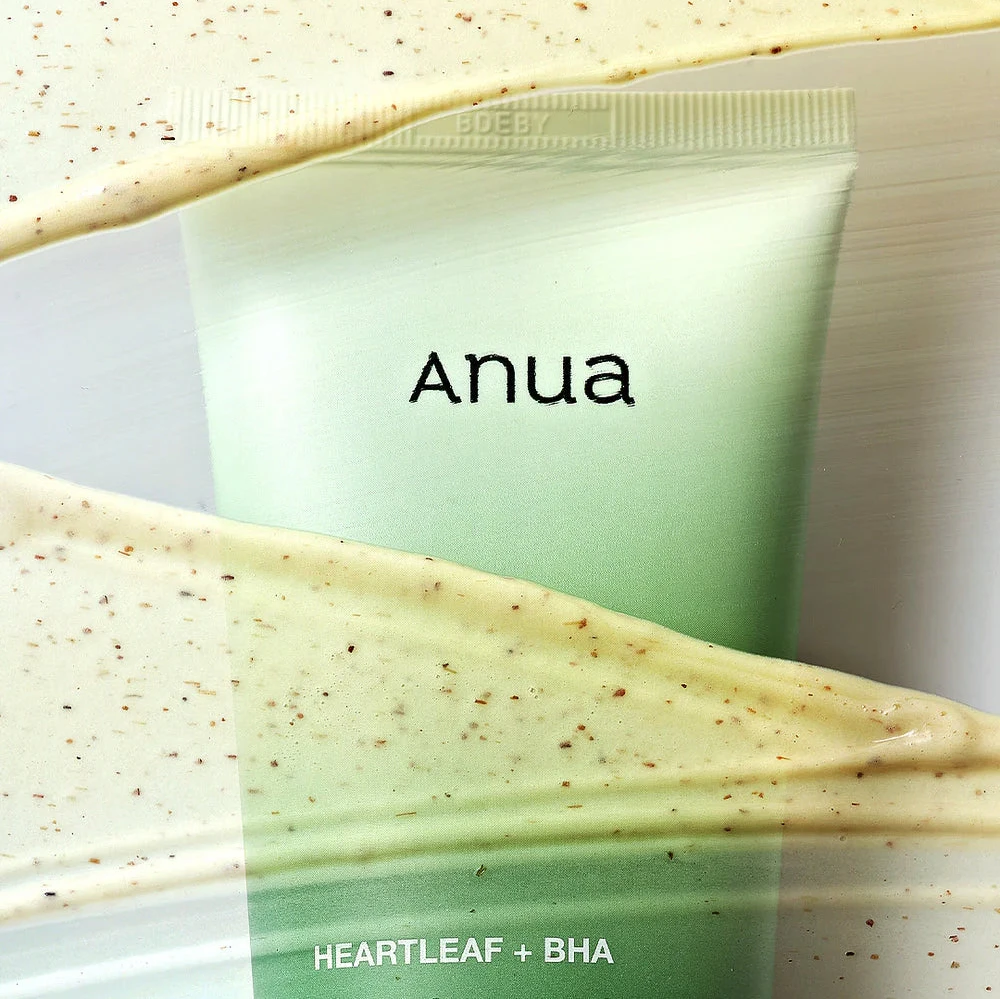 Close-up of Anua Heartleaf Quercetinol Cleansing Foam tube with creamy texture and pore care concept