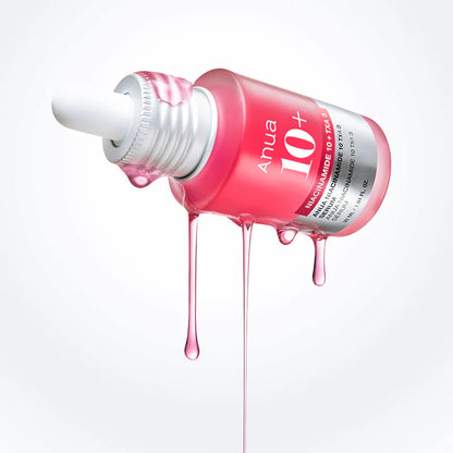 ANUA Niacinamide 10 TXA 4 Serum with liquid texture dripping showing lightweight consistency