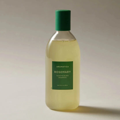 AROMATICA Rosemary Scalp Scaling Shampoo on neutral background highlighting herbal formula