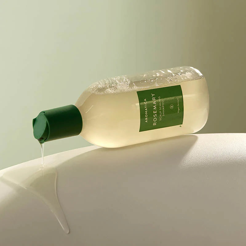 AROMATICA Rosemary Scalp Scaling Shampoo on neutral background highlighting herbal formula