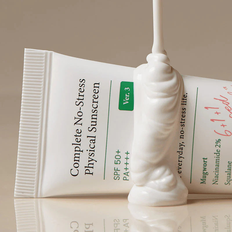 Mineral sunscreen cream texture close-up with AXIS-Y sunscreen tube