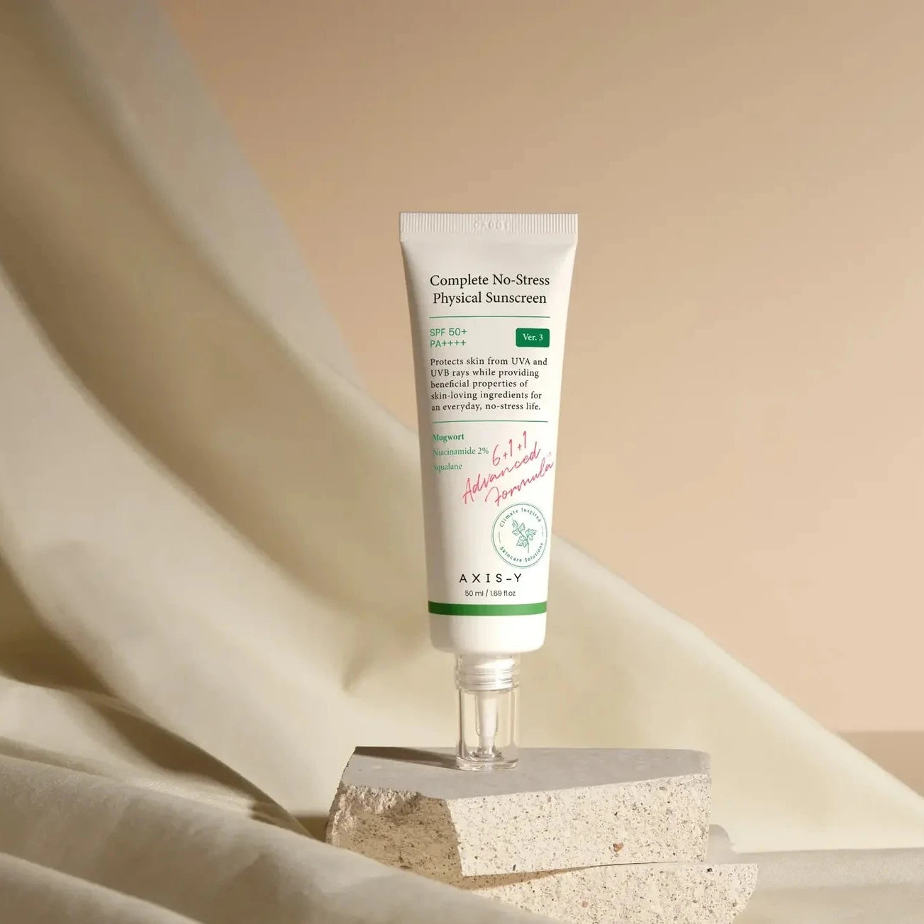 AXIS-Y physical sunscreen packaging with soft neutral skincare styling