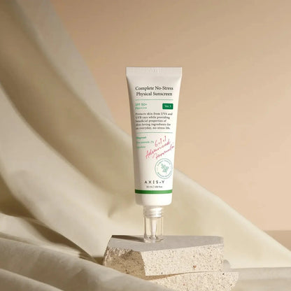 AXIS-Y physical sunscreen packaging with soft neutral skincare styling