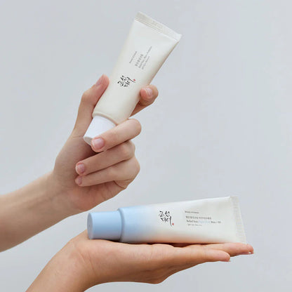 Hand holding Beauty of Joseon Relief Sun Korean sunscreen tube