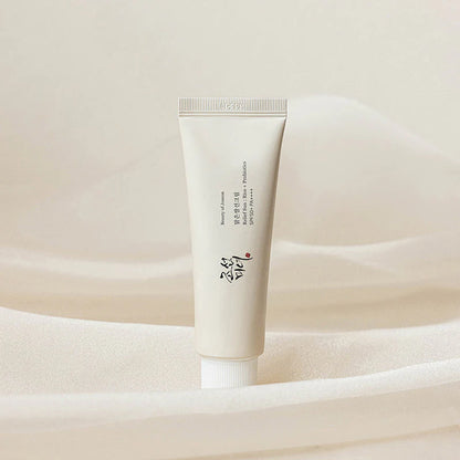 Lightweight Korean sunscreen packaging with soft neutral styling