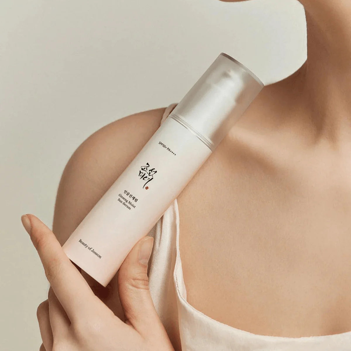 Beauty of Joseon sunscreen serum applied on skin with moisturizing dewy finish