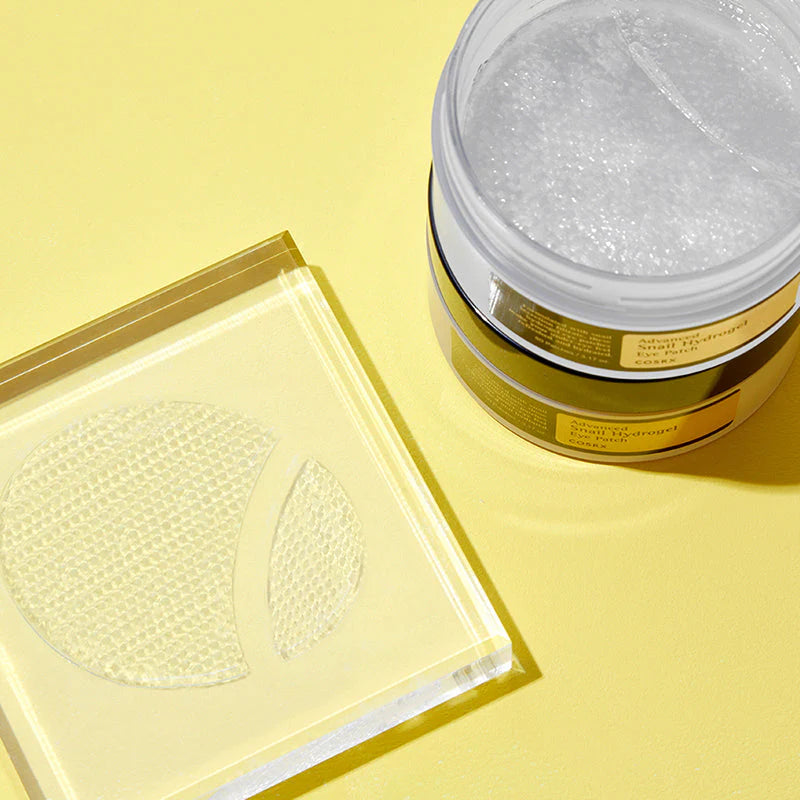 COSRX Advanced Snail Eye Patch with hydrogel patch texture and skincare spatula