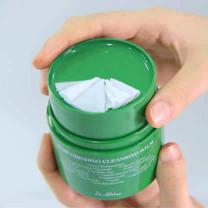 Hand holding Dr. Althea Pure Grinding Cleansing Balm showing innovative hygienic Korean cleansing balm packaging