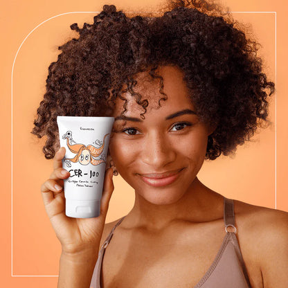 Model holding Elizavecca CER-100 protein treatment for healthy and shiny hair