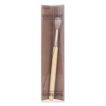 Etude contour brush in packaging product display