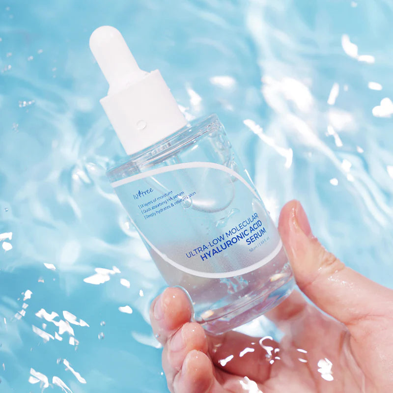 Isntree Ultra-Low Molecular Hyaluronic Acid Serum texture close-up with clear watery consistency