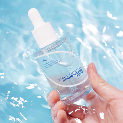 Isntree Ultra-Low Molecular Hyaluronic Acid Serum texture close-up with clear watery consistency