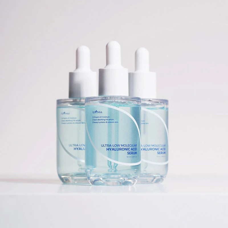 Isntree Ultra-Low Molecular Hyaluronic Acid Serum trio bottles showcasing hydrating skincare routine set
