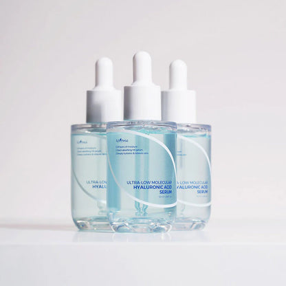 Isntree Ultra-Low Molecular Hyaluronic Acid Serum trio bottles showcasing hydrating skincare routine set