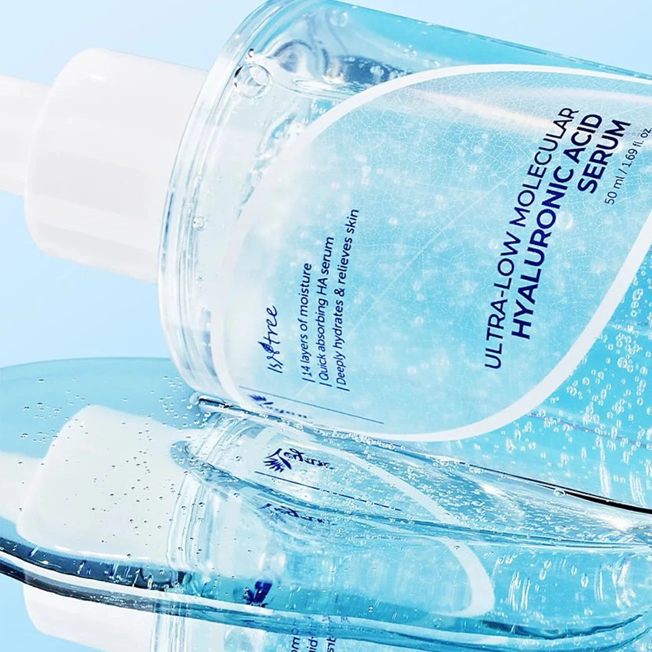 Isntree Ultra-Low Molecular Hyaluronic Acid Serum texture close-up with clear watery consistency