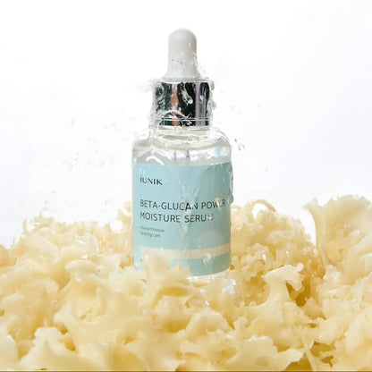 iUNIK Beta-Glucan Power Moisture Serum with textured background showcasing hydrating properties