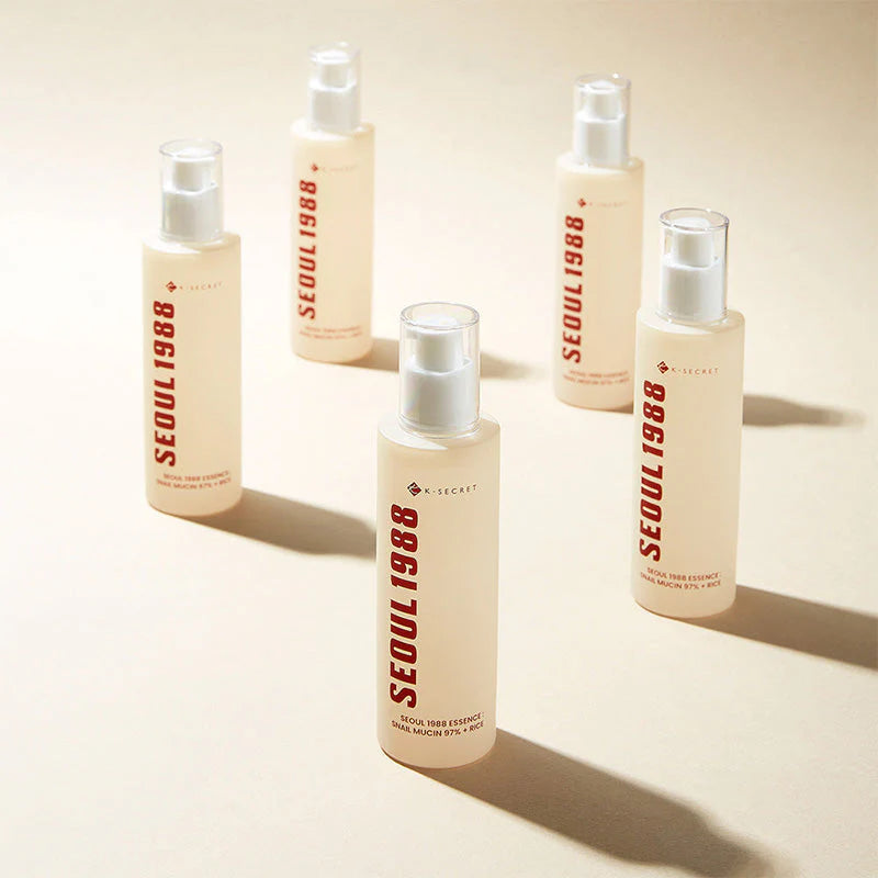 K-Secret Seoul 1988 Snail Mucin Essence collection of bottles arranged together, Korean skincare in Dammam