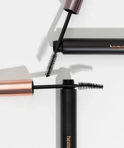 heimish Dailism Smudge Stop Mascara Curling brush close-up showing curved wand for lash lifting effect