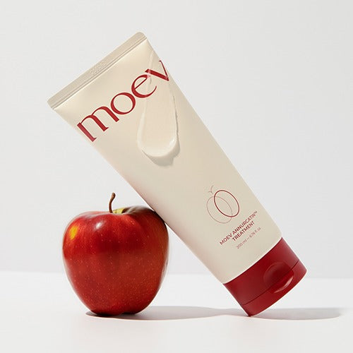 Moev Annurcatin Treatment with apple highlighting fresh and nourishing hair care concept