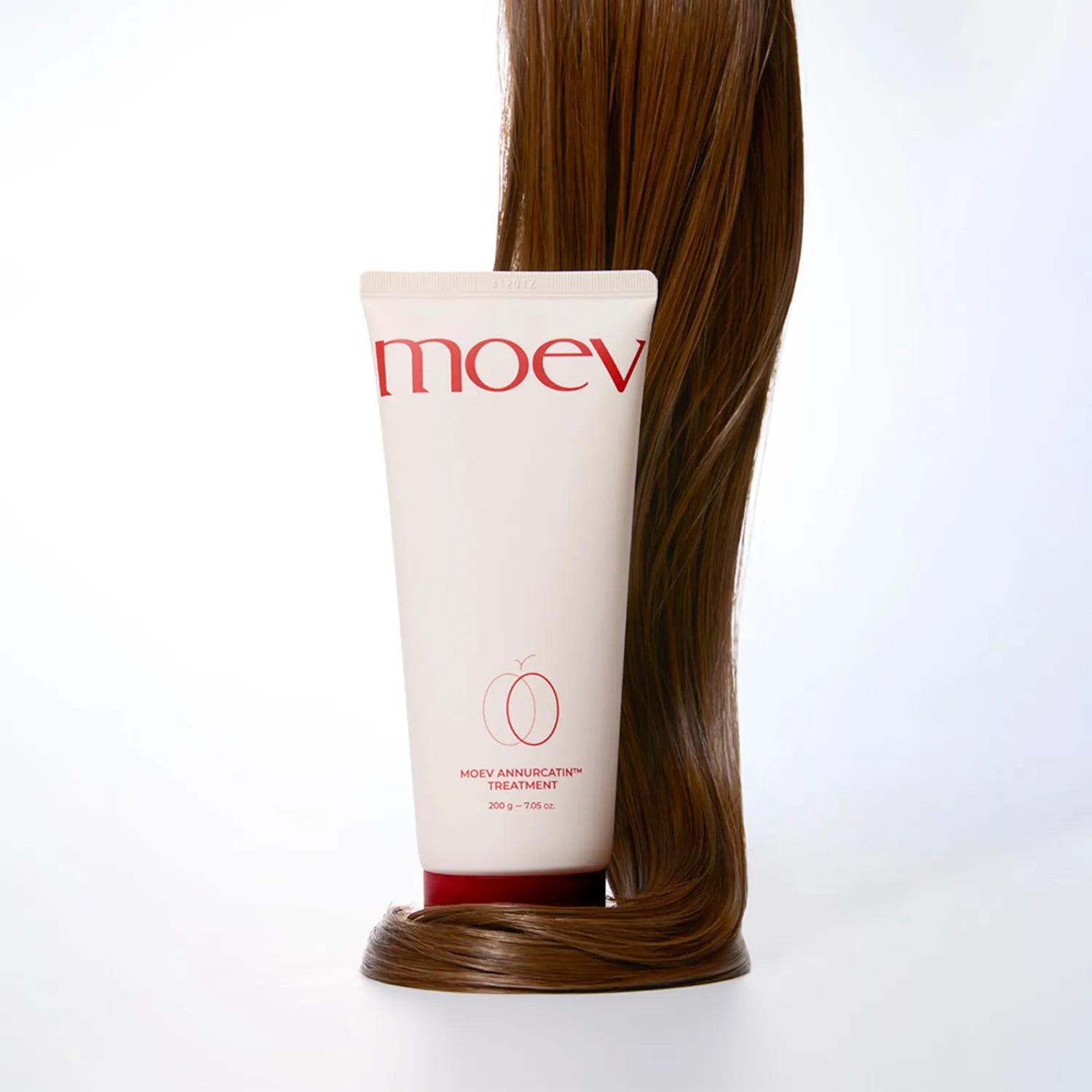 Moev Annurcatin Treatment with smooth hair strand highlighting shine and repair effect
