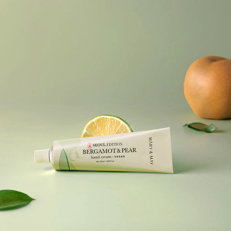 Mary&May hand cream tube with citrus fruit styling