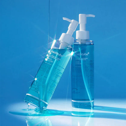 medicube Zero Pore Blackhead Deep Cleansing Oil bottles with light reflection pore care cleansing oil display