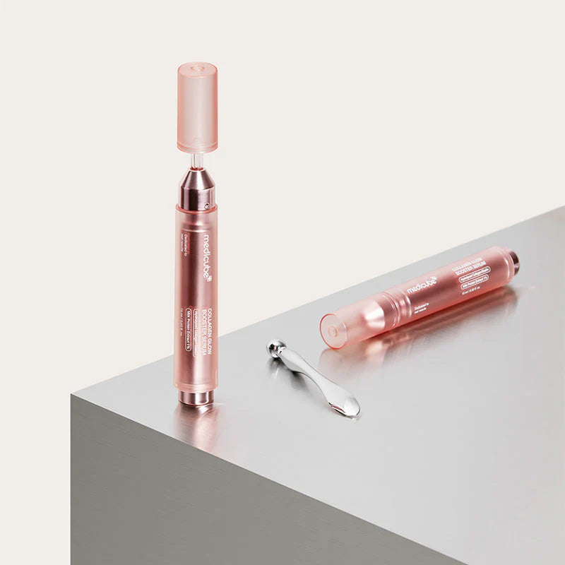 medicube Collagen Glow Booster Serum pen on pedestal glow boosting collagen serum product