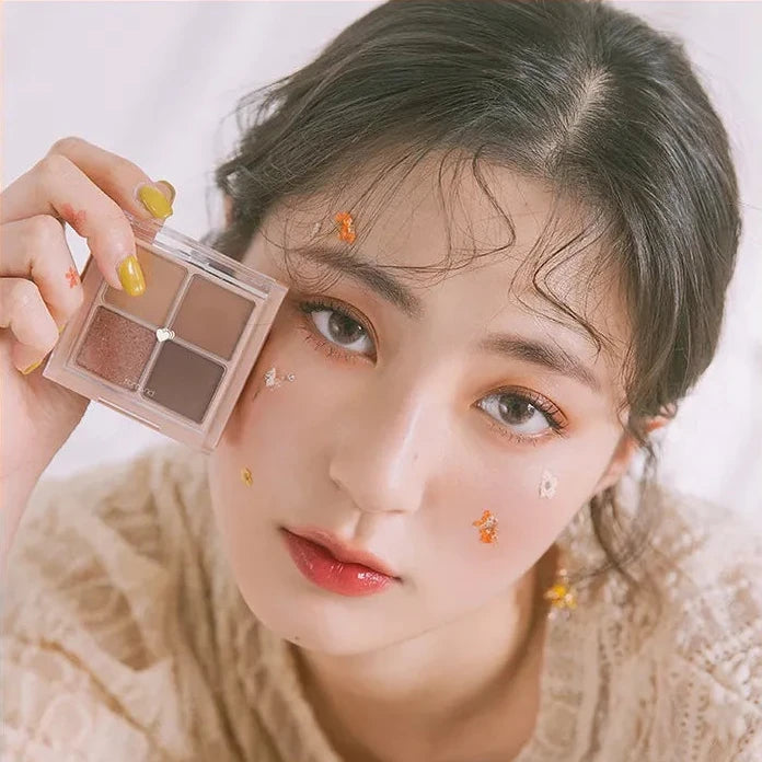 Model wearing rom&nd Better Than Eyes Dry Ragras palette showing natural brown eye look