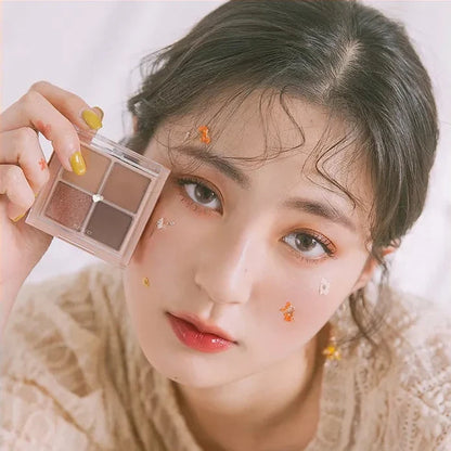 Model wearing rom&nd Better Than Eyes Dry Ragras palette showing natural brown eye look