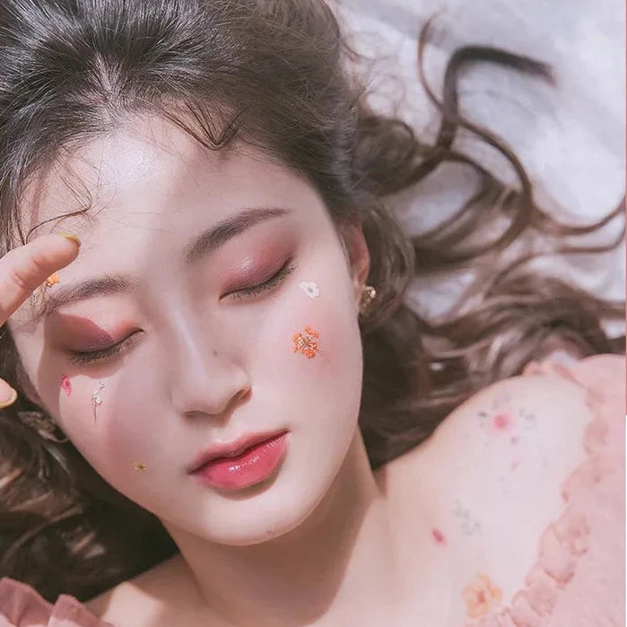 Model wearing rom&nd Better Than Eyes Dry Rose palette showing soft pink eye makeup look