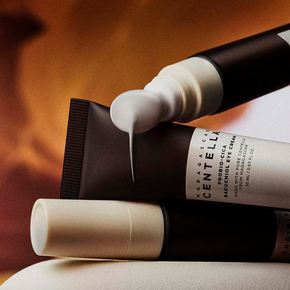 SKIN1004 Madagascar Centella Probio-Cica Bakuchiol Eye Cream close-up applicator and cream texture firming eye care product