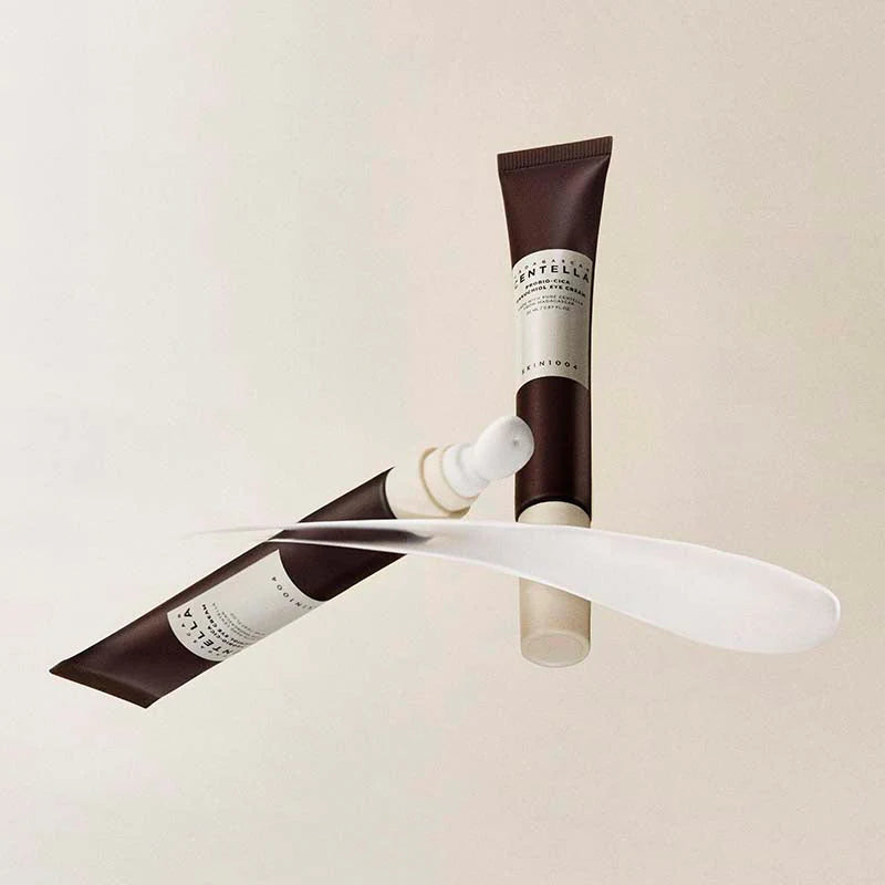 SKIN1004 Madagascar Centella Probio-Cica Bakuchiol Eye Cream tube with texture swatch smoothing eye cream formula