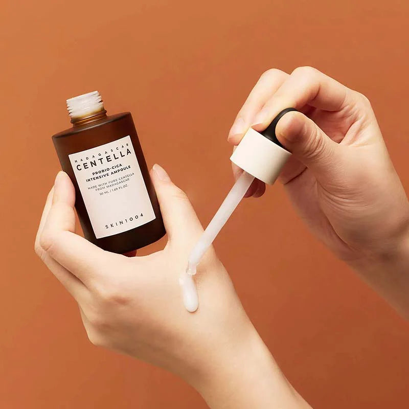 SKIN1004 Madagascar Centella Probio-Cica Intensive Ampoule dropper in hand rich hydrating ampoule application
