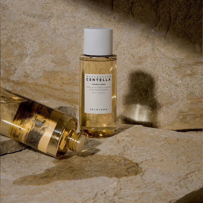 SKIN1004 Madagascar Centella Toning Toner bottle on textured stone calming skincare toner product display