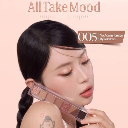 model holding peripera All Take Mood Palette 05 No Acorn Passes By Autumn demonstrating usage
