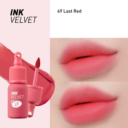 peripera Ink Velvet Lip Tint 49 Last Red enhances lips with a bold and defined look.