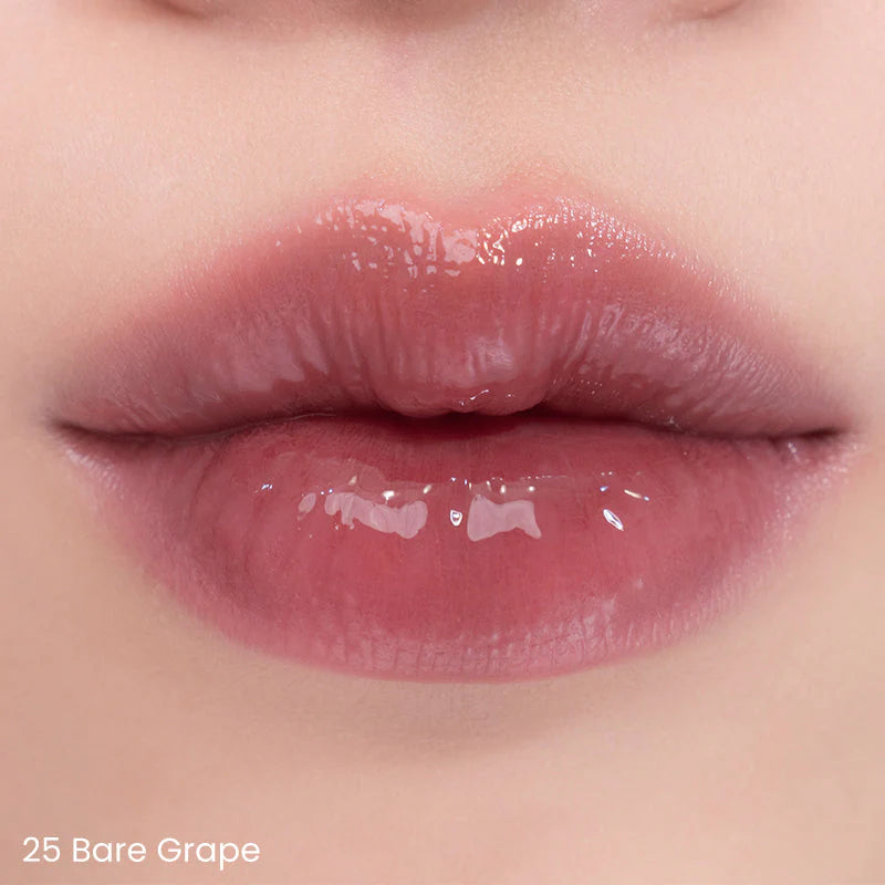 lip swatch of rom&nd Juicy Lasting Tint 25 Bare Grape showing soft pink shine